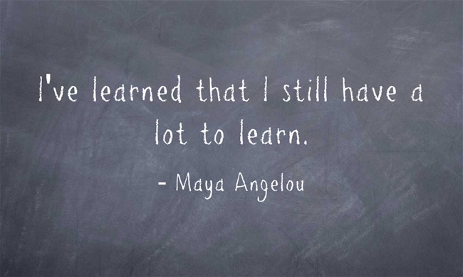 White text on a chalkboard background: "I've learned that I still have a lot to learn." Maya Angelou